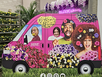Tu Bloom and friends at the 2026 Philadelphia Flower Show with the Wave Petunias Van art.